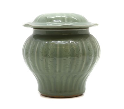 Lot 290 - A Chinese celadon jar and cover