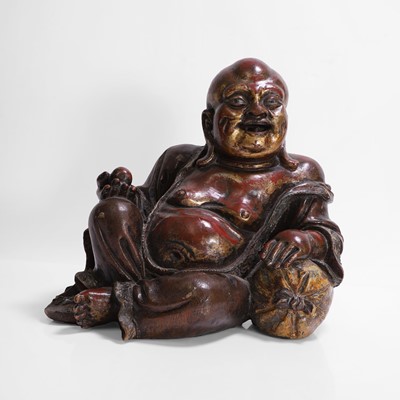 Lot 392 - A Chinese gilt-lacquered wood figure