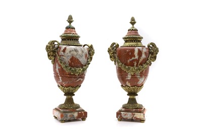 Lot 303 - A pair of rouge marble and gilt metal urns