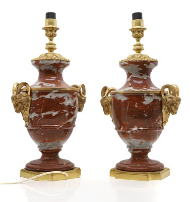 Lot 672 - A pair of rouge marble and gilt metal lamps