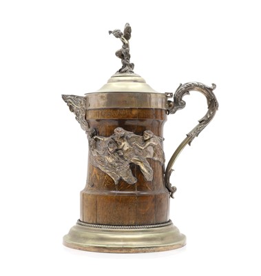 Lot 327 - An Oak and electroplate mounted flagon