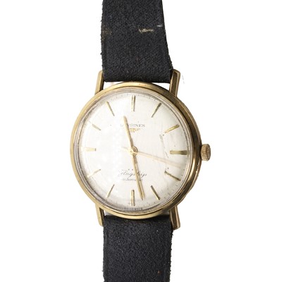 Lot 35K - A 9ct gold Longines Flagship automatic strap watch