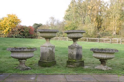 Lot 639 - Two pairs of composition stone campagna garden urns