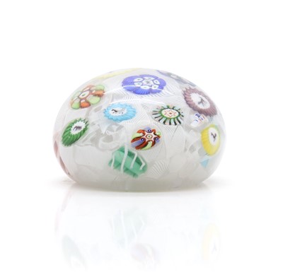 Lot 218 - A Baccarat space millefiori glass paperweight