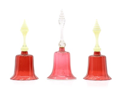 Lot 225 - A collection of three Victorian cranberry glass bells