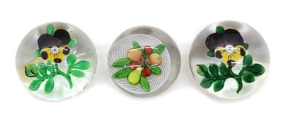 Lot 202 - A group of three French glass paperweights