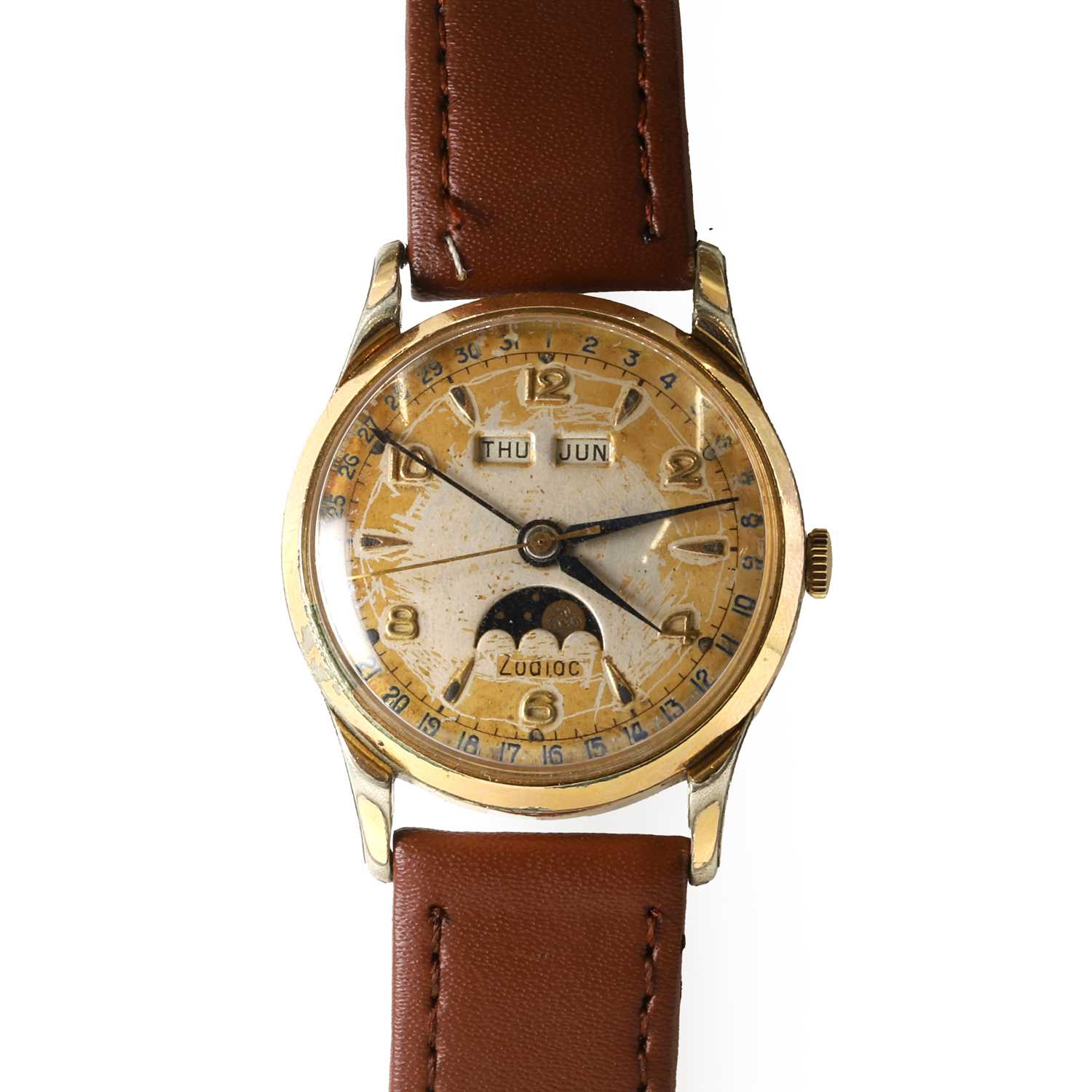 Lot 34 - A gold plated stainless steel Zodiac moon phase mechanical strap watch, c.1950