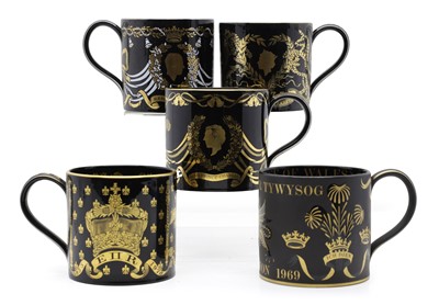 Lot 176 - A group of five Wedgwood Royal Commemorative black mugs