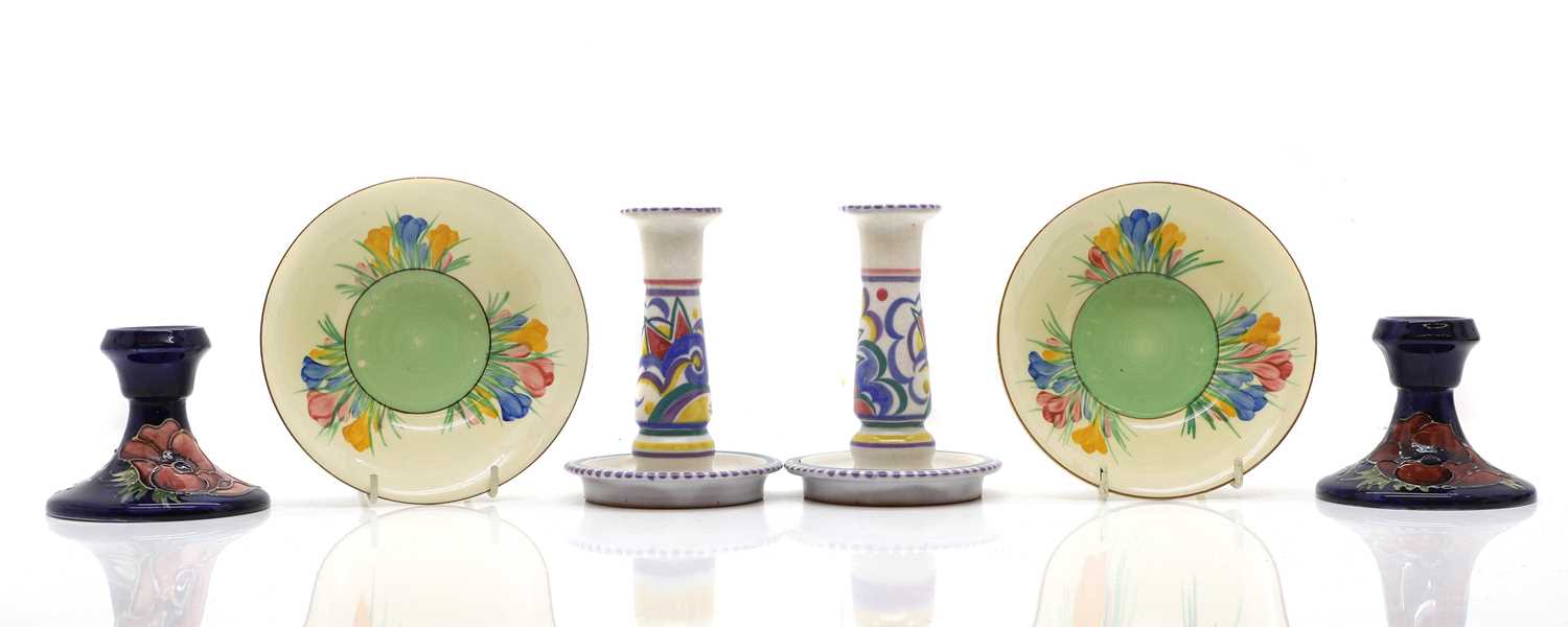 Lot 180 - A pair of Moorcroft 'Poppy' dwarf candlesticks