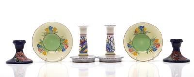 Lot 180 - A pair of Moorcroft 'Poppy' dwarf candlesticks