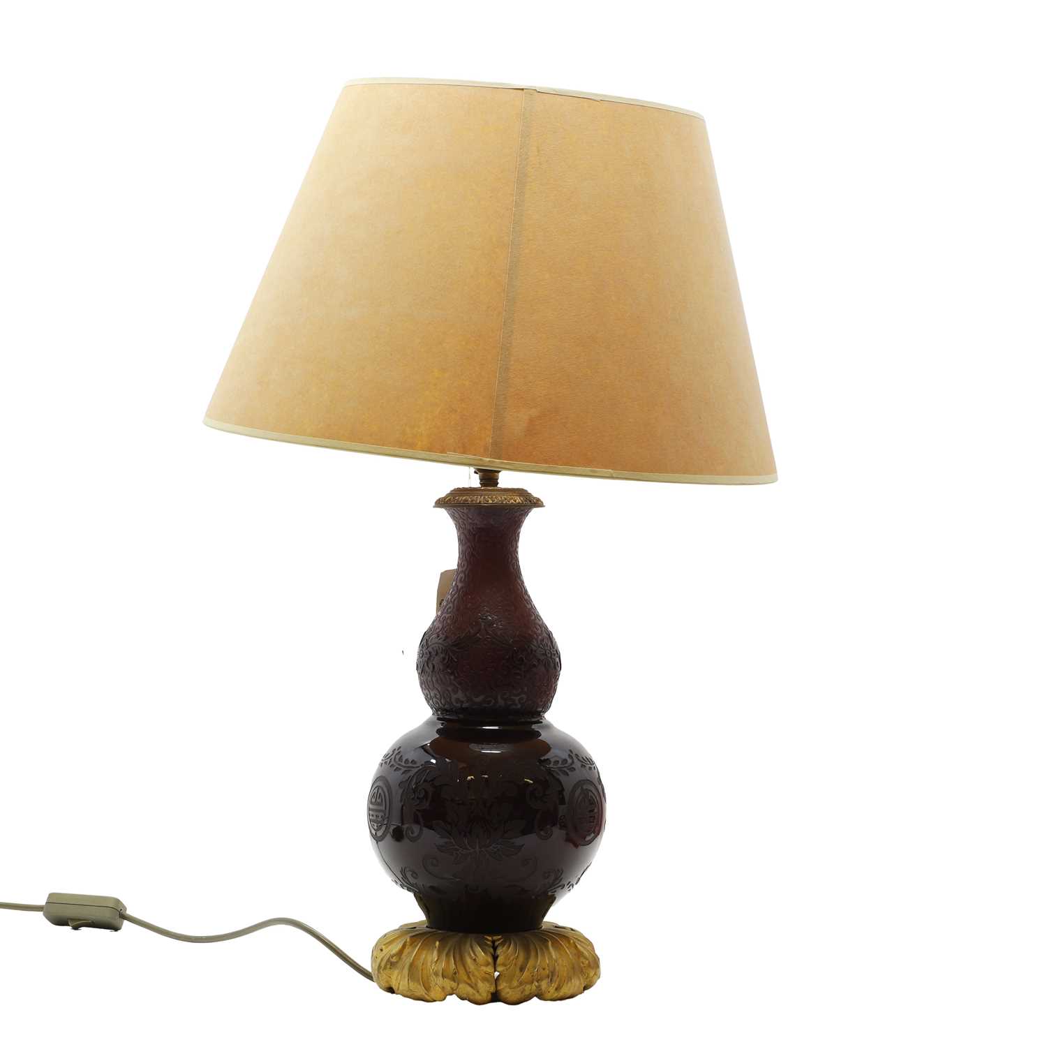 Lot 541 - An Art Deco Steuben Plum Jade style glass lamp base