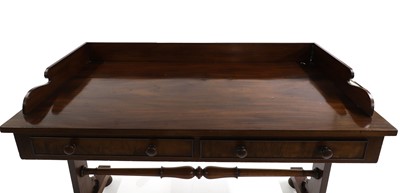 Lot 675 - A Victorian mahogany writing table