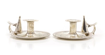 Lot 10 - A pair of Victorian silver chambersticks