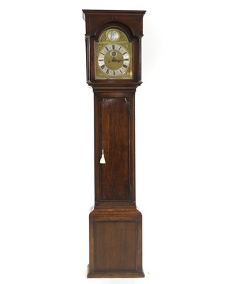 Lot 596 - An oak longcase clock