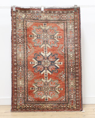 Lot 497 - A Caucasian red ground rug