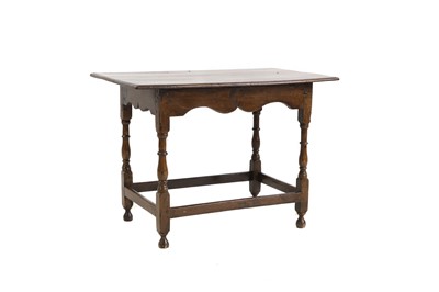 Lot 593 - An oak plank top table