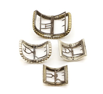 Lot 102 - A group of four shoe buckles