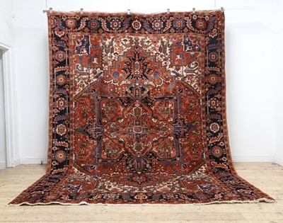 Lot 505 - A Heriz wool carpet