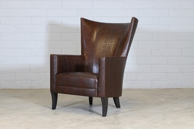 Lot 437 - A wingback armchair