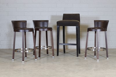 Lot 402 - A group of three Tonon brown leather bar stools