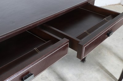Lot 477 - A contemporary leather writing desk