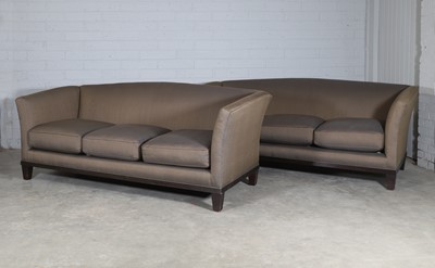 Lot 420 - A pair of three-seater sofas