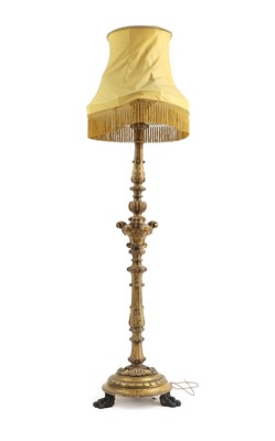 Lot 592 - A carved and gilt standard lamp