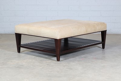 Lot 434 - A leather-upholstered ottoman