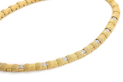 Lot 245 - An 18ct gold diamond and ruby woven necklace, by Roberto Coin