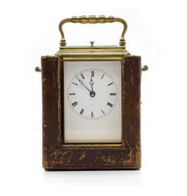 Lot 242 - A French brass gorge case carriage timepiece