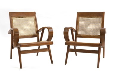 Lot 639 - A pair of teak and cane armchairs