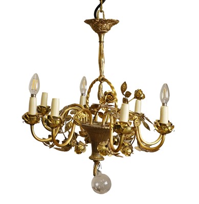 Lot 650 - An eight branch gilt metal ceiling light