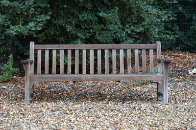 Lot 699 - A teak garden bench