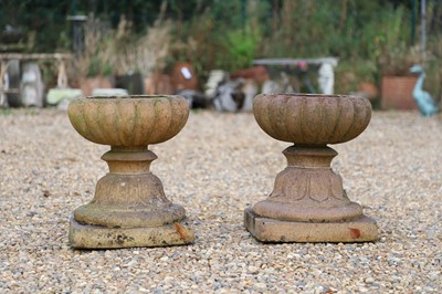 Lot 703 - A pair of cast iron campagna urns