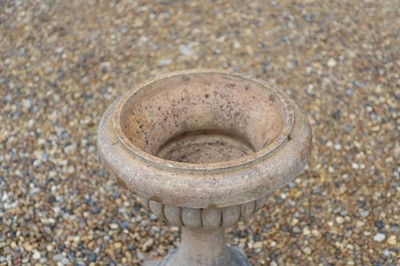 Lot 704 - A terracotta low garden urn