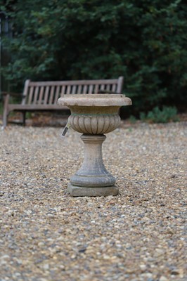 Lot 704 - A terracotta low garden urn