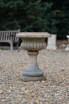 Lot 704 - A terracotta low garden urn