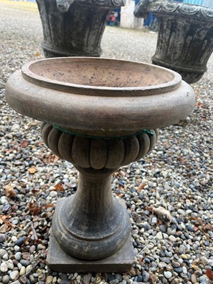 Lot 704 - A terracotta low garden urn