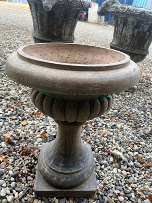 Lot 704 - A terracotta low garden urn