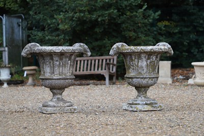 Lot 705 - A pair of garden campagna urns