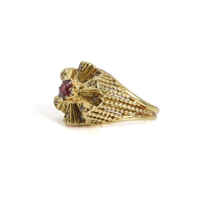 Lot 98 - An 18ct gold garnet and diamond dress ring, c.1960