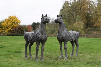 Lot 625 - A pair of bronzed-metal horses