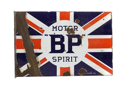 Lot 215 - A double-sided BP Motor Spirit enamel sign