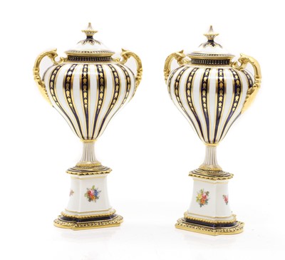 Lot 315 - A pair of Royal Crown Derby porcelain vase and covers