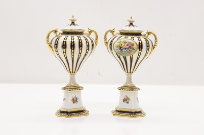 Lot 315 - A pair of Royal Crown Derby porcelain vase and covers