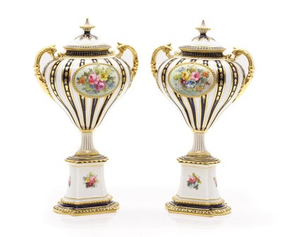 Lot 315 - A pair of Royal Crown Derby porcelain vase and covers