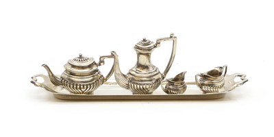 Lot 30 - A miniature silver five-piece tea service