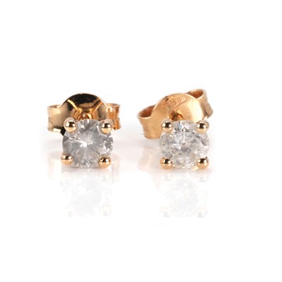 Lot 96 - A pair of rose gold diamond stud earrings