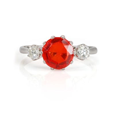 Lot 281 - An 18ct white gold fire opal and diamond ring