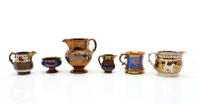 Lot 191 - A collection of copper lustre ware